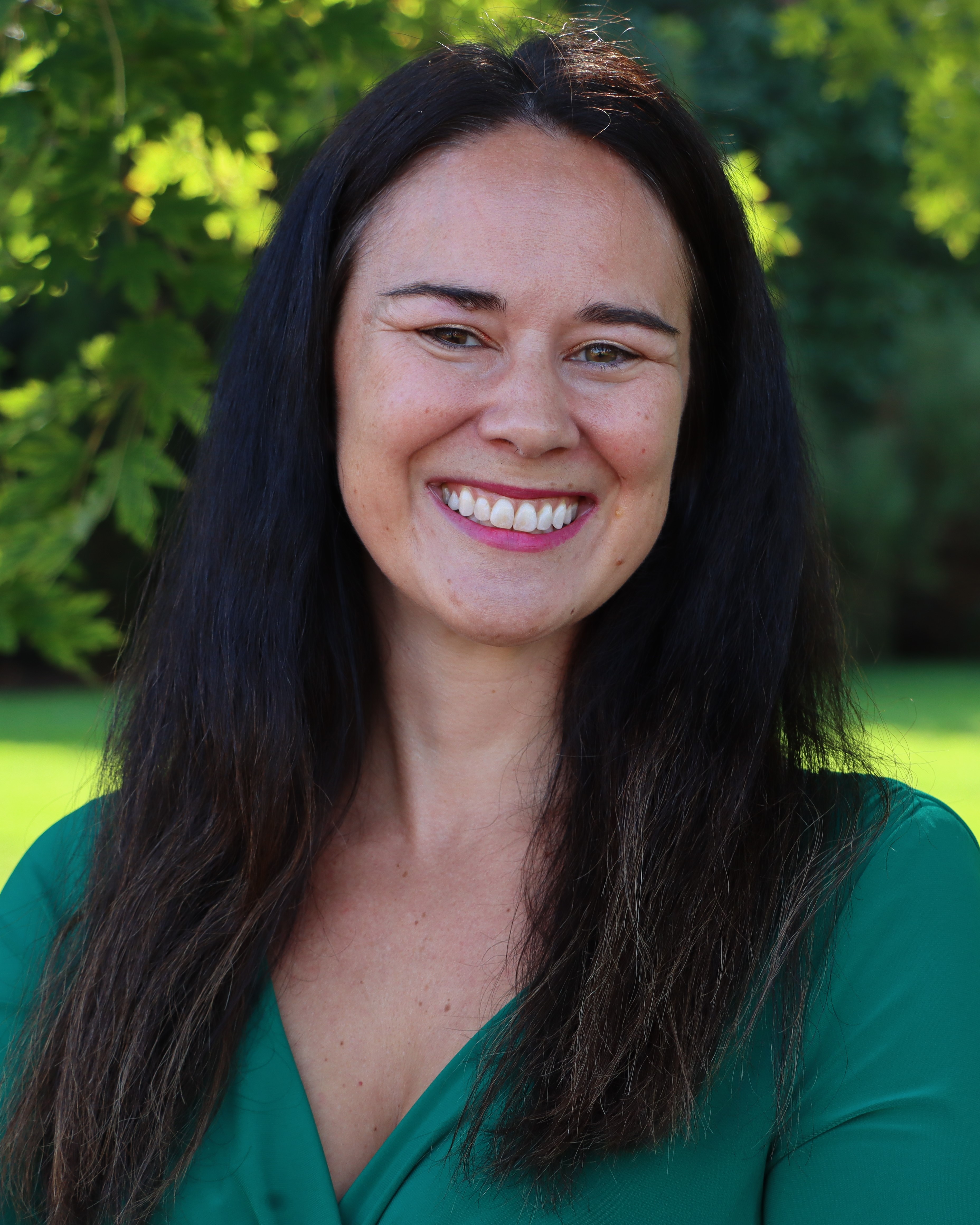 Faculty member smiling