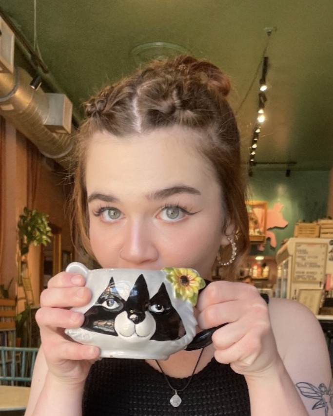 alana drinking coffee