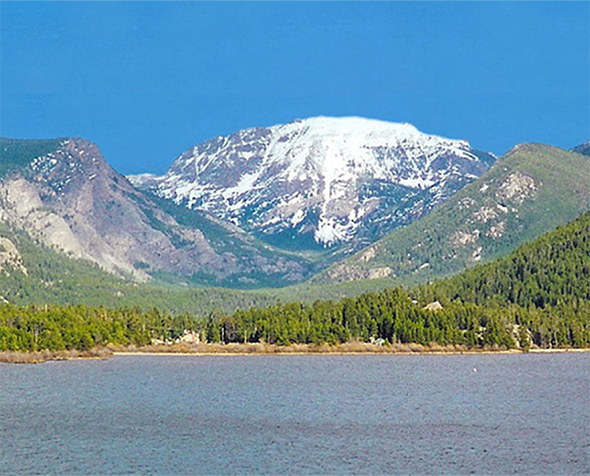 grand lake with mountain in background