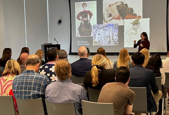 Professor Campbell presents to a group in Chicago