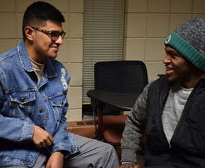 Issac Vargas (left) and James Artis laugh together at a BSA meeting