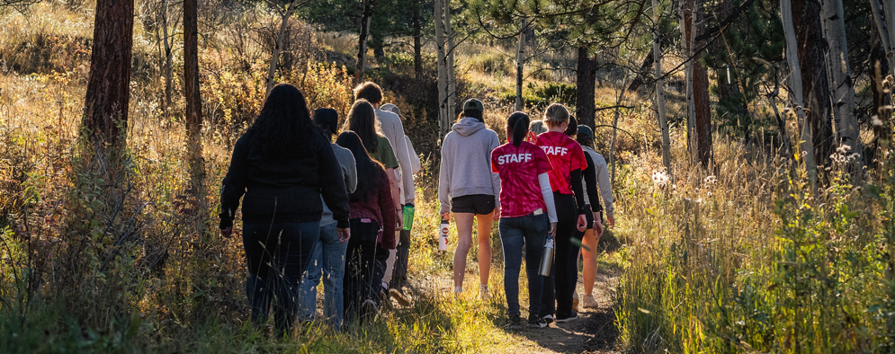 students hiking at KMC
