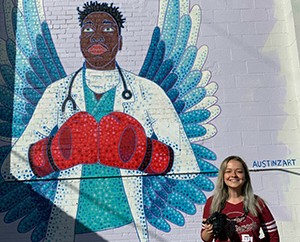 Barbara Urzua found inspiration writing a story about murals in support of front line workers, by artist Austin Zucchini-Fowler (who is also a swimming coach at DU) for her internship at 303 Magazine