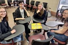 students playing a board game together