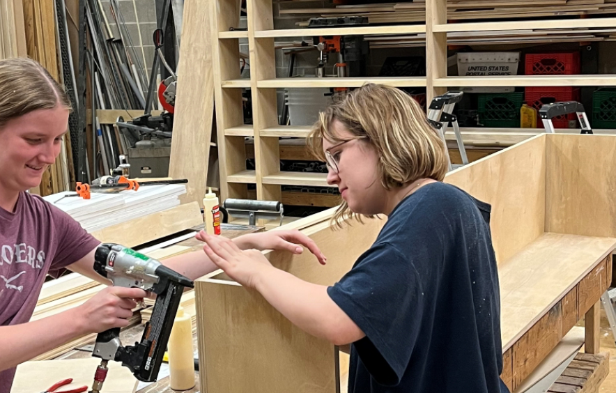 Theatre students in the workshop building a set.