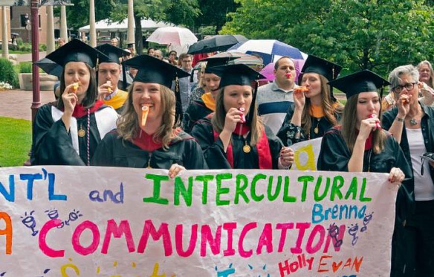 MA IIC students gather at graduation