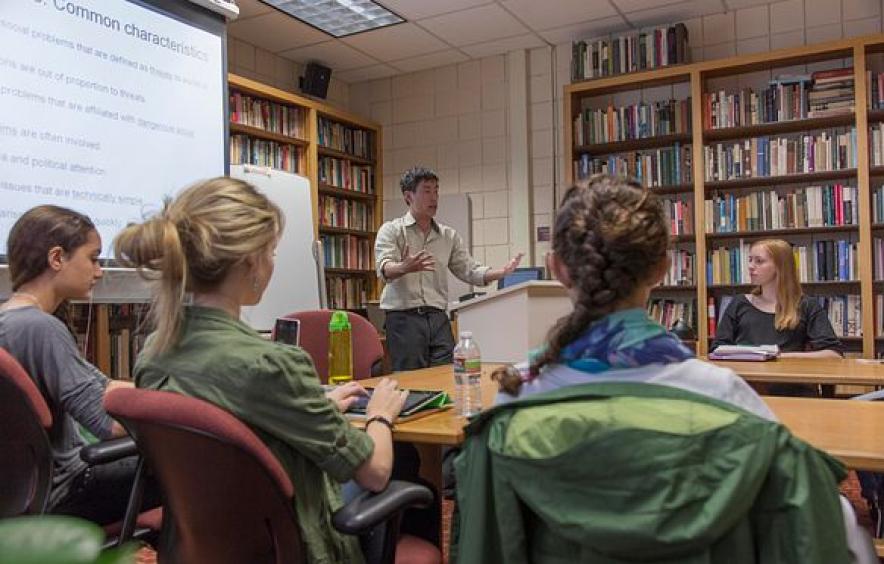 instructor leads lecture with students listening