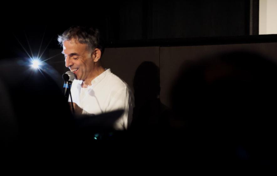 Man talking into a mic