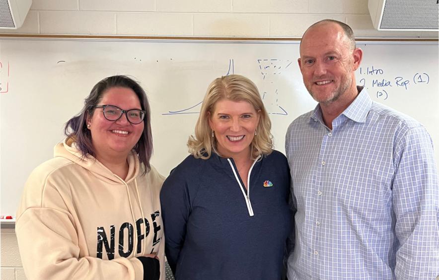 Group photo of student Juliana Ortiz, alum Amy Nisenson, and Chair Dr. Derigan Silver from left to right. They stand in front of a classroom whiteboard. 