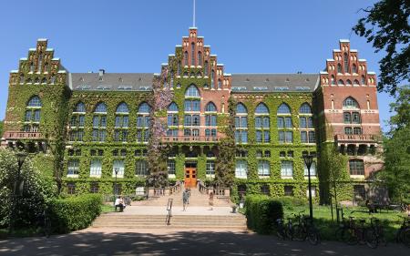 Brick building covered in vines at Lund University in Sweden