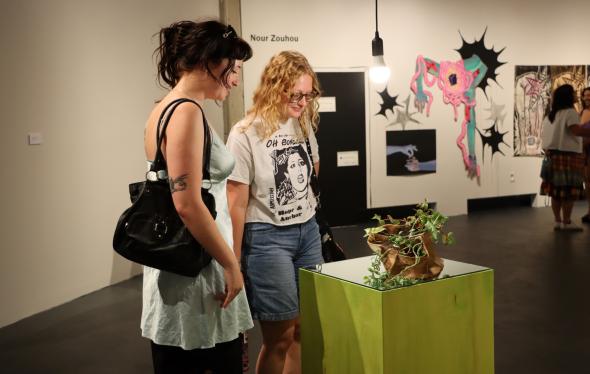 students looking at art