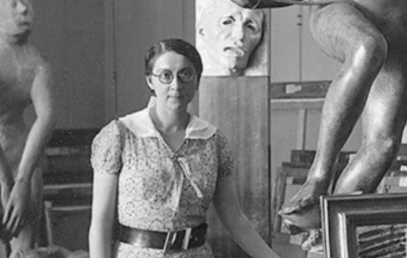 Rose Valland poses with sculptures and canvases.
