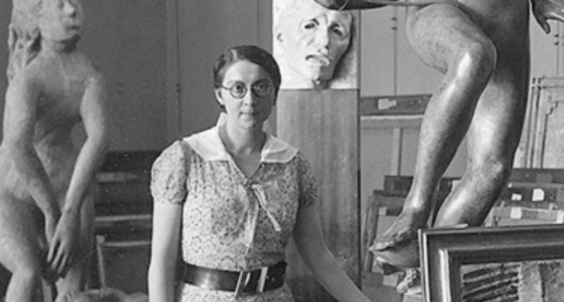 Rose Valland poses with sculptures and canvases.