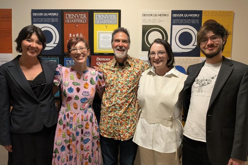 Photo of W. Scott Howard with students the celebration of the Denver Quarterly's 60th anniversary. Courtesy photo. 