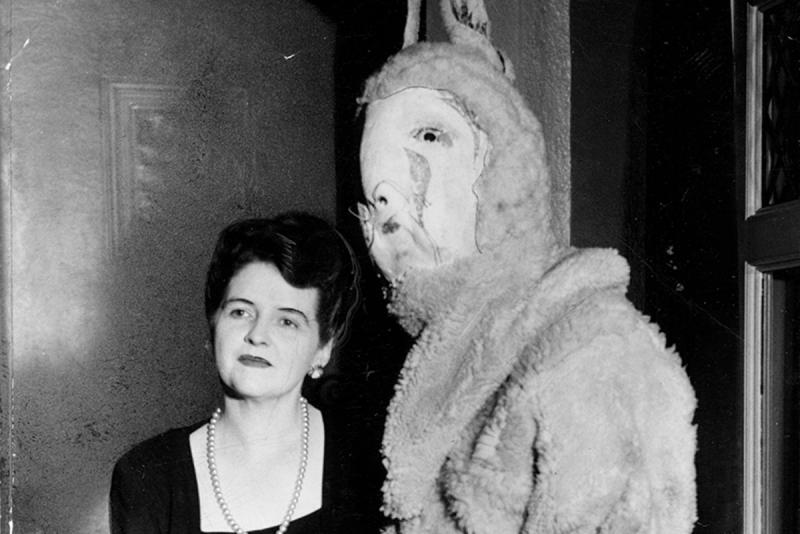 Mary Coyle Chase next to a costume rabbit