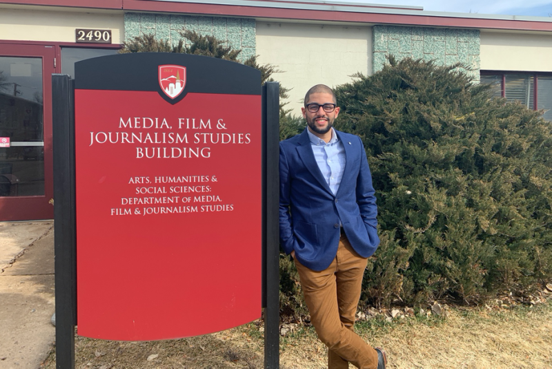 Professor Kareem El Damanhoury stands outside the MFJS building.