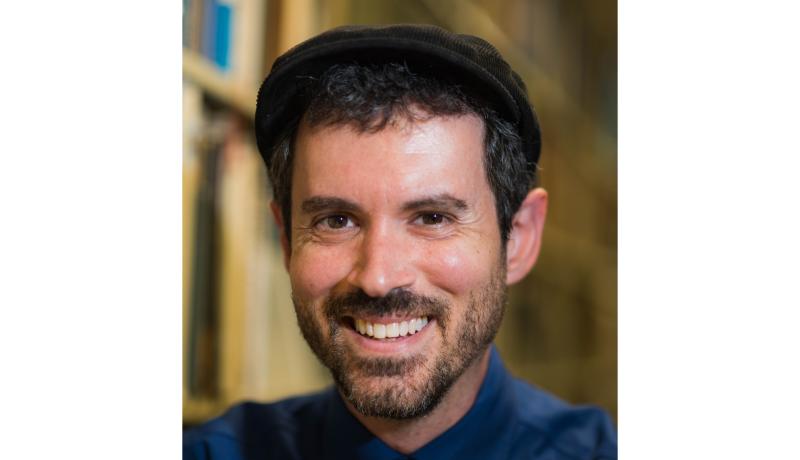 Headshot of DU professor Joshua Furman.