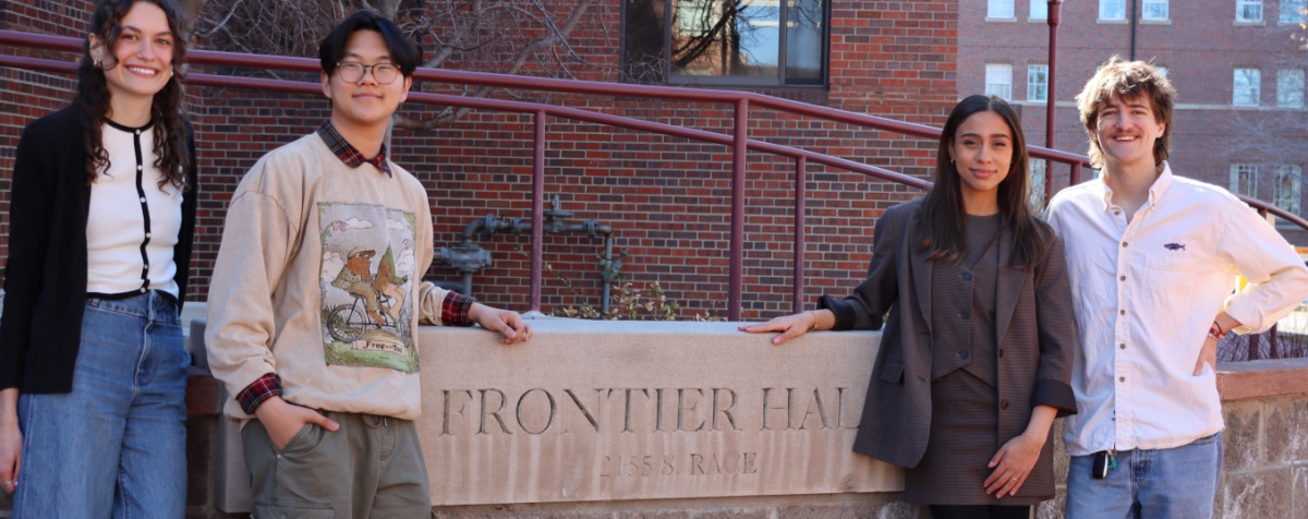 Standing in front of frontier hall