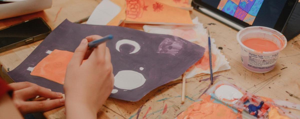 Student paints in a studio course