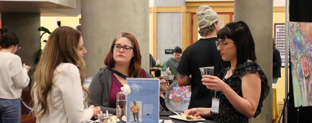 people talking at a table