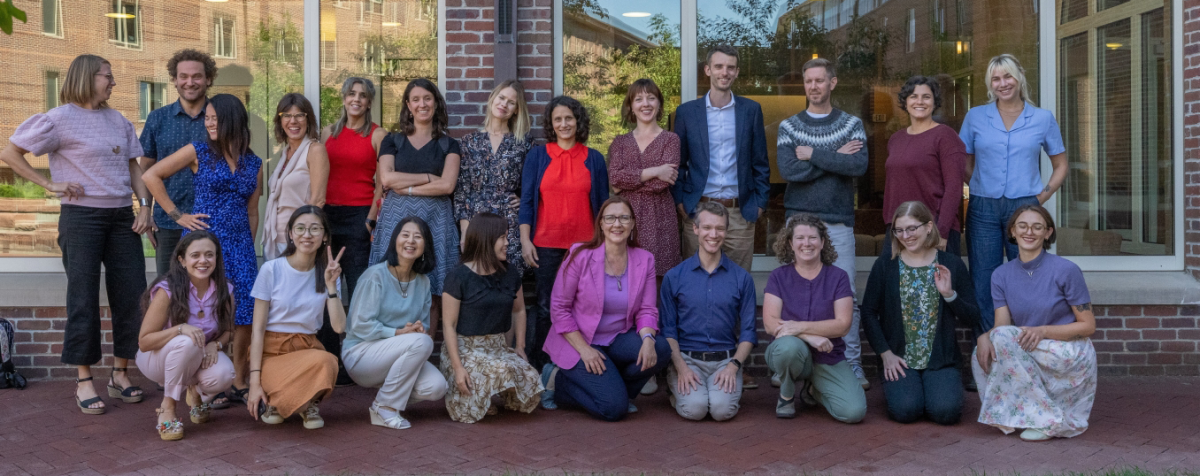 faculty smiling together