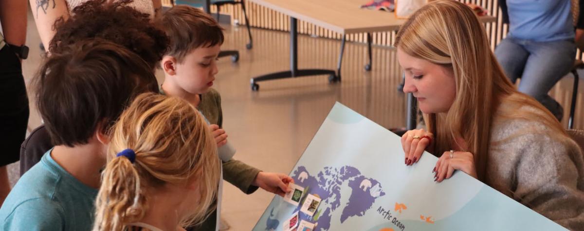 Student presenting to kids