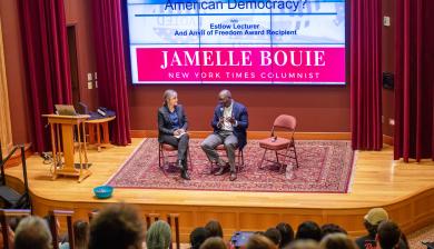 Lynn Clark and Jamelle Bouie sit in conversation on stage