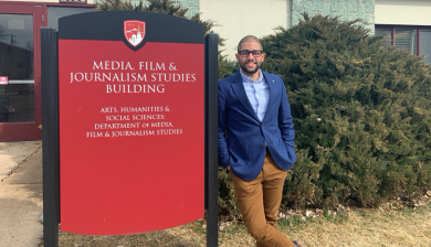 Professor Kareem El Damanhoury stands outside the MFJS building.