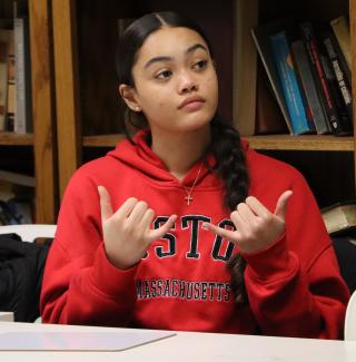 Student learning sign language