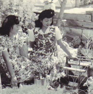 Historical photo of women at the Amache gardens