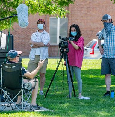 DU students and faculty complete a film project while socially distancing outside over the summer of 2020