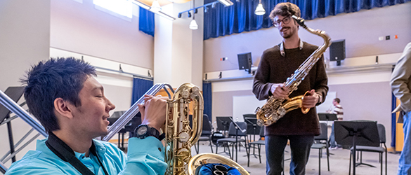 two saxophonists chat