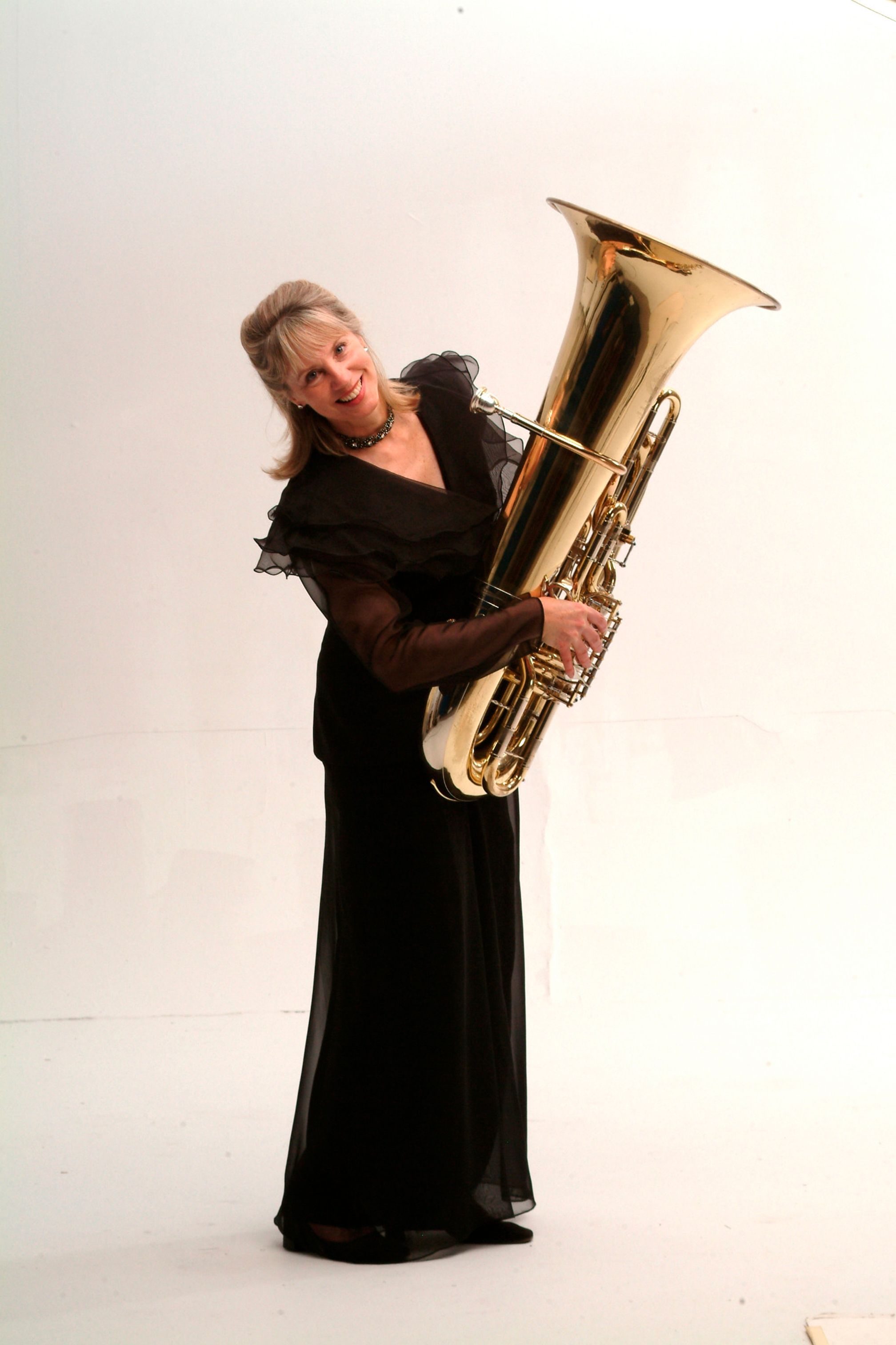 Kathleen Brantigan holding a tuba