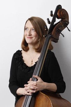 Susan Cahill holding a double bass